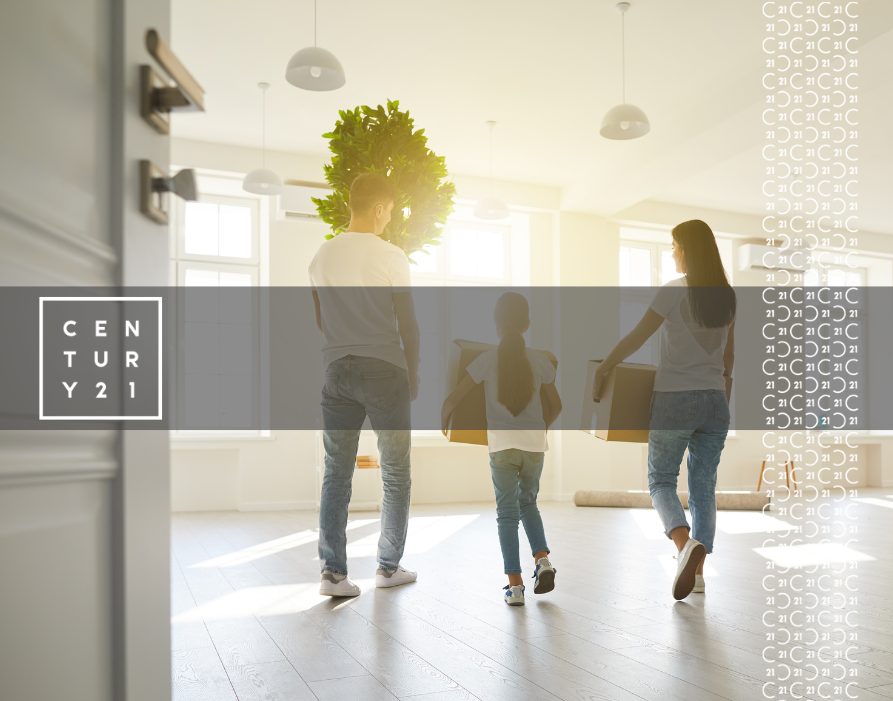 Happy-Family-with-Children-Moving-with-Boxes-in-a-New-Apartment-House.-Back-View-1 (1)